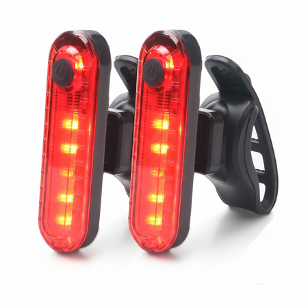 Two super bright USB rechargeable bike tail lights with wide-angle lenses and clip mounts