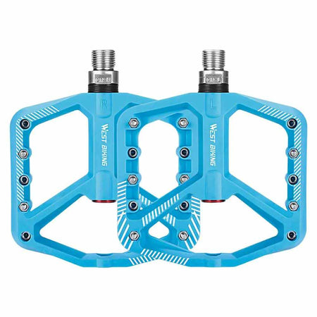 Blue wide bicycle pedals with non-slip surface and lightweight design